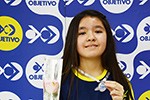 Cerimônia de premiação dos alunos do Objetivo medalhistas na OBA, na OBR e na OBI